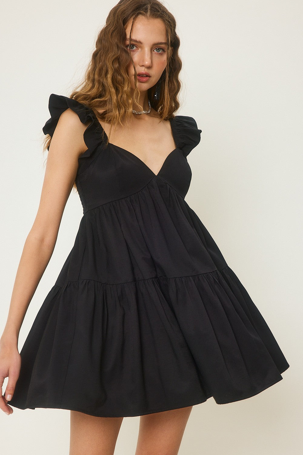 The Trista Ruffled Shoulder Mini Dress | Black |