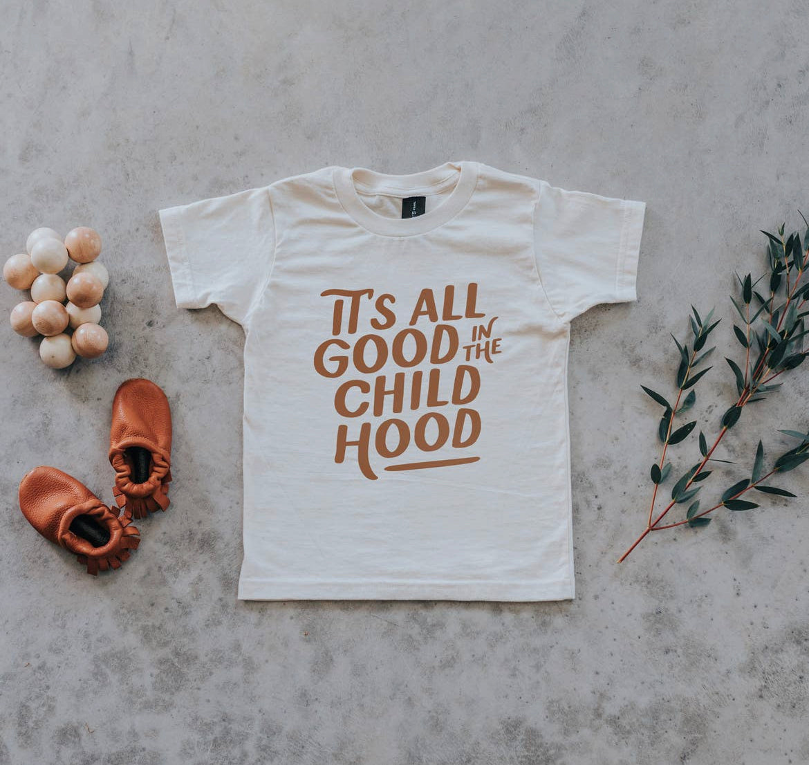 Its All Good In The Child Hood Graphic Tee | Cream + Camel |